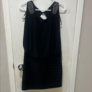 Elegant Black Sleeveless Dress with Embellished Straps